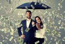 raining money on couple